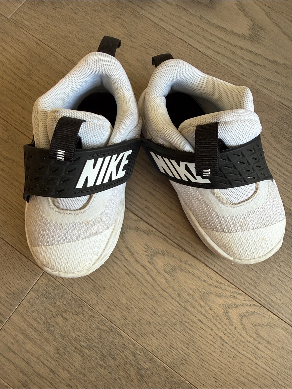 Nike Kids White and Black Slip-On Sneakers